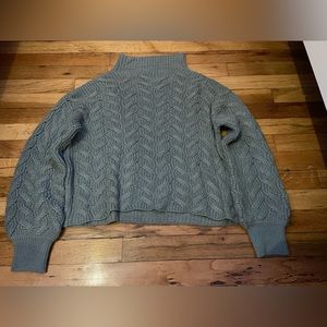 Turtleneck cable knit sweater